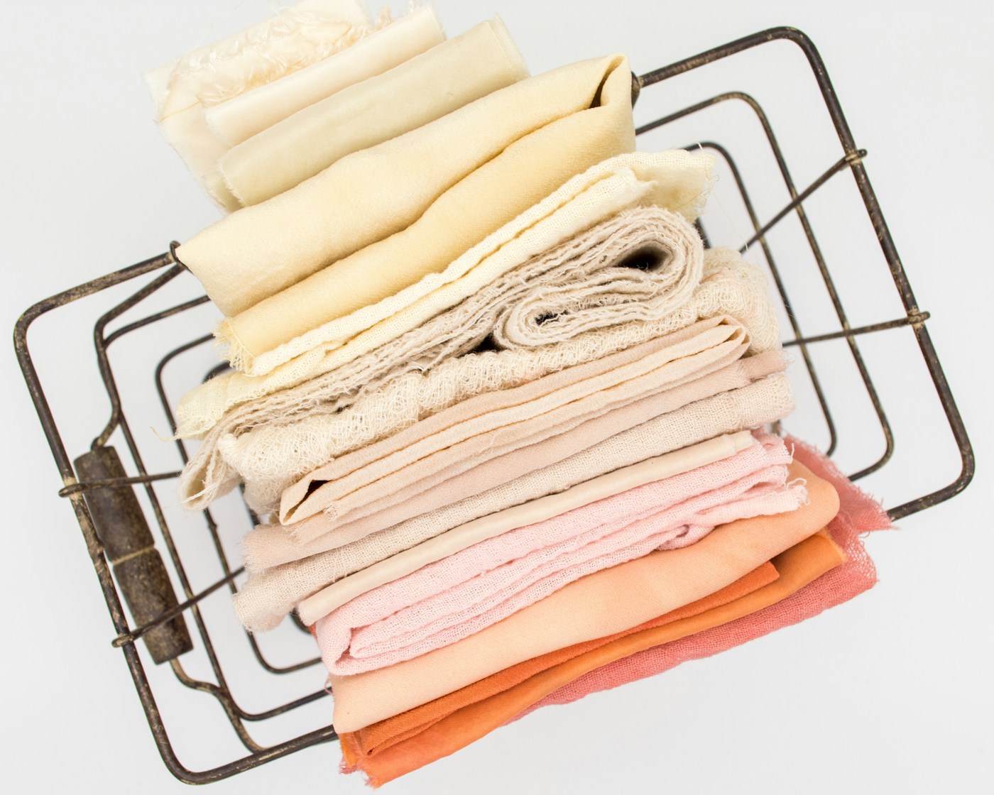 Folded textiles arranged for product presentation